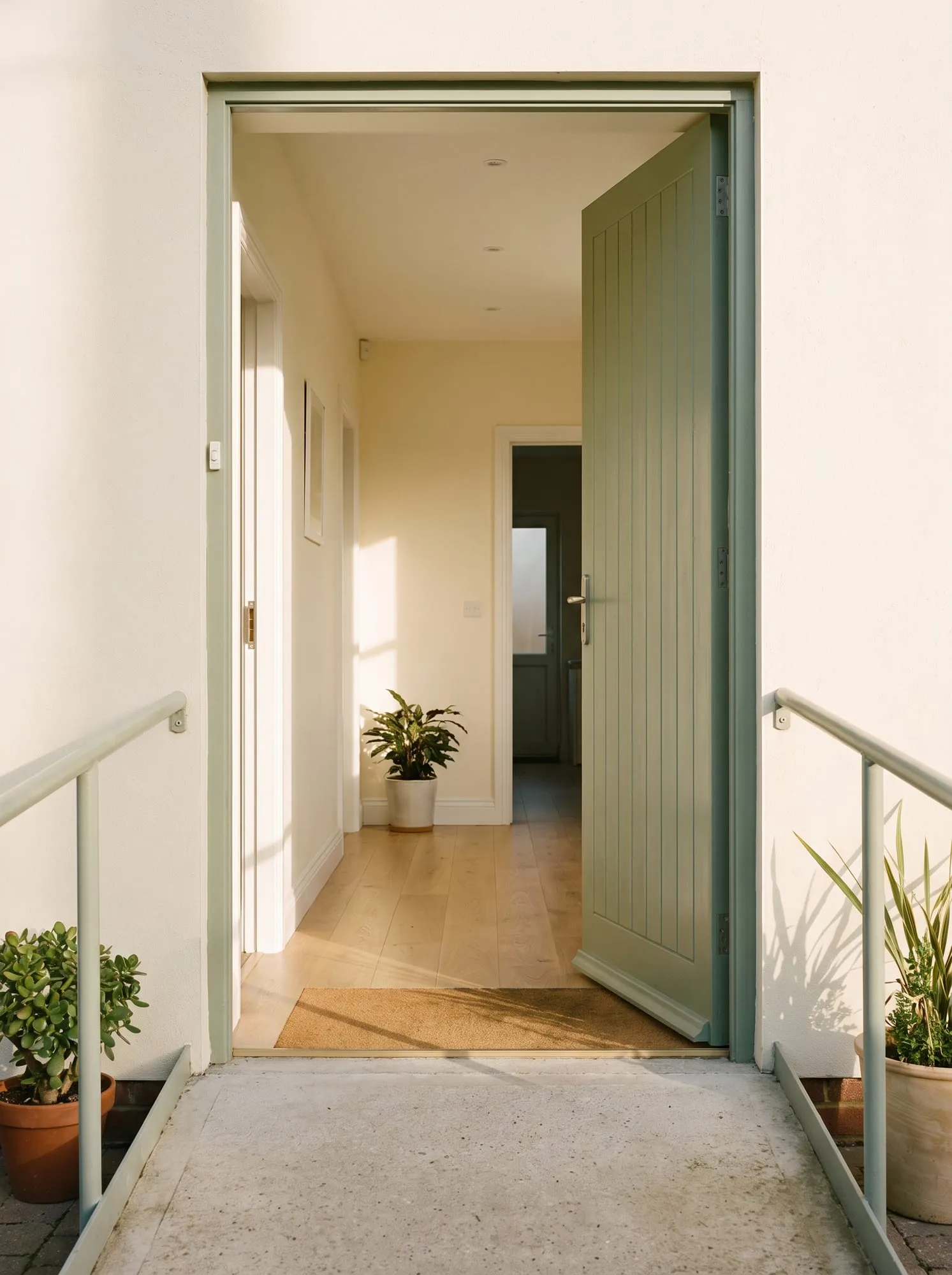 The step-free side entrance and the corridor behind it